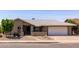 Charming single-story home featuring a well-maintained yard and a two-car garage at 2309 W Naranja Ave, Mesa, AZ 85202