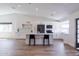 Open concept kitchen with large island, stainless steel appliances, and modern decor at 2309 W Naranja Ave, Mesa, AZ 85202