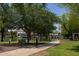 Picturesque lake view with homes in the background and a tranquil walkway at 2309 W Naranja Ave, Mesa, AZ 85202