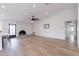 Cozy living room with a unique fireplace and ample natural light at 2309 W Naranja Ave, Mesa, AZ 85202