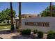 Exterior view of Saratoga Center, showcasing its architecture and landscaping at 2309 W Naranja Ave, Mesa, AZ 85202