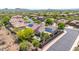 Spacious backyard with patio, solar panels, beautiful landscaping, and a neighborhood view at 2405 W Memorial Dr, Anthem, AZ 85086