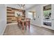 Dining room with unique wood accent wall and a table with seating for six at 2405 W Memorial Dr, Anthem, AZ 85086