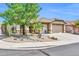 Charming single-story home with a well-maintained xeriscaped front yard and desert-friendly landscaping at 2405 W Memorial Dr, Anthem, AZ 85086