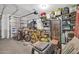 Spacious two-car garage with ample storage space, including shelving and overhead storage racks for organization at 2405 W Memorial Dr, Anthem, AZ 85086