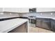 Stylish kitchen featuring white countertops, stainless steel appliances, and modern tile backsplash at 2405 W Memorial Dr, Anthem, AZ 85086