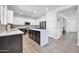 Bright, open kitchen with large island, stainless appliances, and modern cabinetry at 2405 W Memorial Dr, Anthem, AZ 85086