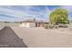 View of the backyard with desert landscaping and block wall at 2605 E Fountain St, Mesa, AZ 85213