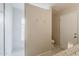 Bathroom with an updated shower and a small window at 2605 E Fountain St, Mesa, AZ 85213
