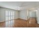 Bright and spacious bedroom featuring hardwood floors, ceiling fan, and natural light at 2605 E Fountain St, Mesa, AZ 85213