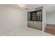 Cozy dining area with tile floor, built in cabinets, and stylish lighting at 2605 E Fountain St, Mesa, AZ 85213