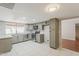 Bright, open kitchen with stainless steel appliances and tile flooring at 2605 E Fountain St, Mesa, AZ 85213