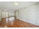 Spacious living room featuring hardwood floors, neutral paint, and natural light at 2605 E Fountain St, Mesa, AZ 85213