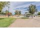 Gathering-friendly playground featuring play structures and a covered picnic area for enjoying a day outdoors at 2605 E Fountain St, Mesa, AZ 85213