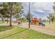 Well-maintained playground with colorful equipment and climbing wall for entertainment and physical activity at 2605 E Fountain St, Mesa, AZ 85213