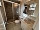 Tiled bathroom with shower and vanity, offering a functional space at 3062 N 42Nd Ave, Phoenix, AZ 85019
