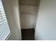 Hall closet with neutral carpet, white walls, and ample shelving space at 3062 N 42Nd Ave, Phoenix, AZ 85019