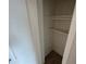 Open closet features shelving and a tile floor at 3062 N 42Nd Ave, Phoenix, AZ 85019
