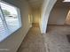 The entryway with tile flooring and arched openings that create a unique architectural design at 3062 N 42Nd Ave, Phoenix, AZ 85019