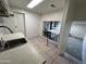 Cozy kitchen featuring a view of the basement spiral staircase at 3062 N 42Nd Ave, Phoenix, AZ 85019