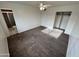 Primary bedroom featuring ensuite bathroom, walk-in closet, and carpeted flooring at 3062 N 42Nd Ave, Phoenix, AZ 85019