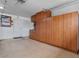 Spacious garage featuring wall storage cabinets and ample room for vehicles and storage at 4323 E Dublin St, Gilbert, AZ 85295