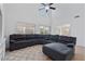 Spacious living room with a comfortable sectional sofa, neutral tones, and plenty of natural light at 4323 E Dublin St, Gilbert, AZ 85295