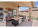 Comfortable covered patio with cushioned seating, perfect for outdoor relaxation and entertaining at 4323 E Dublin St, Gilbert, AZ 85295