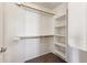 Organized closet with shelving and wooden rods, maximizing storage space at 4380 E Renee Dr, Phoenix, AZ 85050