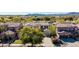 Expansive aerial view showcases the home's setting within a beautifully landscaped community at 4497 E Carriage Way, Gilbert, AZ 85297