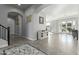 Grand foyer with exquisite flooring, arched doorways, and a view into the spacious interior at 4497 E Carriage Way, Gilbert, AZ 85297