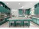 Well-equipped kitchen featuring a center island with bar seating and stainless steel appliances at 4497 E Carriage Way, Gilbert, AZ 85297