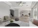 Inviting living room complemented by stylish furniture, decor, and a staircase view at 4497 E Carriage Way, Gilbert, AZ 85297