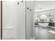 Bright main bathroom features tiled walk-in shower and tub under arched window at 4497 E Carriage Way, Gilbert, AZ 85297