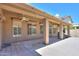 Covered patio with tile flooring and views of the backyard at 4560 E Paso Trl, Phoenix, AZ 85050