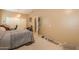 Bedroom featuring neutral colors, carpet and access to a walk-in closet at 4560 E Paso Trl, Phoenix, AZ 85050