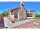Beautiful home exterior with meticulous landscaping, pathway, and architectural detailing at 4560 E Paso Trl, Phoenix, AZ 85050
