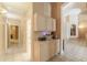 Hallway featuring tile floor, built-in cabinets and views of other rooms at 4560 E Paso Trl, Phoenix, AZ 85050