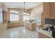 Expansive kitchen featuring an island, modern appliances, and natural lighting at 4560 E Paso Trl, Phoenix, AZ 85050