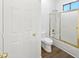 This bathroom includes a toilet and shower with glass doors at 5501 W Whispering Wind Dr, Glendale, AZ 85310