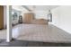 Spacious garage area with storage, utility sink, and water filter at 5501 W Whispering Wind Dr, Glendale, AZ 85310