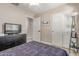 Inviting bedroom with a ceiling fan, closet space, laminate flooring, and ample natural light at 5526 W Ellis Dr, Laveen, AZ 85339