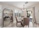 Cozy dining area with a view of the kitchen and access to the backyard at 5526 W Ellis Dr, Laveen, AZ 85339