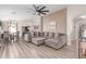 Spacious living room with an open floor plan, modern decor, and lots of natural light at 5526 W Ellis Dr, Laveen, AZ 85339
