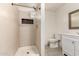 Bathroom features a standup shower and a modern vanity, perfect for relaxation at 5627 E Covina Rd, Mesa, AZ 85205