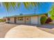 Exterior view of single-Gathering home featuring a well-manicured yard and attached one-car garage at 5627 E Covina Rd, Mesa, AZ 85205
