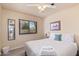 Cozy bedroom with comfortable queen bed and window view at 6073 E Beck Ln, Scottsdale, AZ 85254
