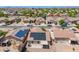 Aerial view of a neighborhood with solar panels on the home at 645 W Kingman Loop, Casa Grande, AZ 85122