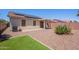 Private backyard with a covered patio and low-maintenance landscaping at 645 W Kingman Loop, Casa Grande, AZ 85122