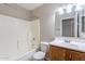 The bathroom offers a shower-tub combo, vanity and sink, and a mirror at 645 W Kingman Loop, Casa Grande, AZ 85122